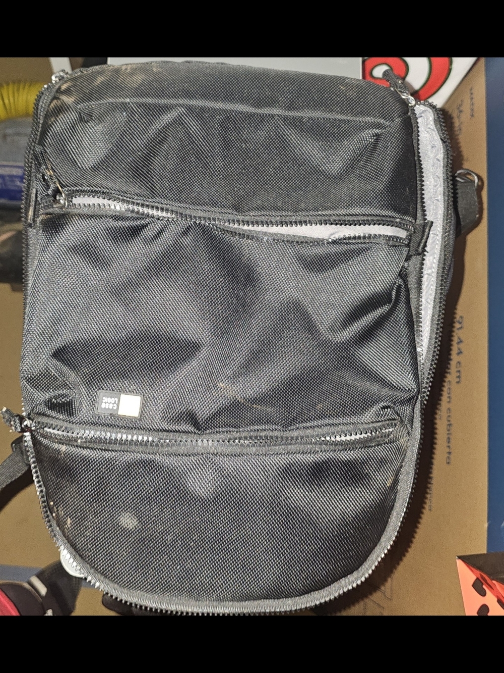 Compact Black Camera Shoulder Bag with Multiple Zip Pockets